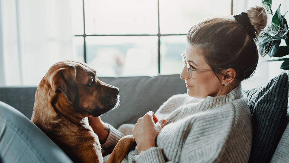 Woman looking at her dog