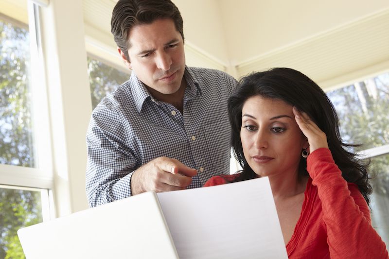 couple reviewing energy-bills